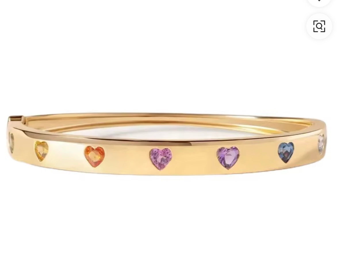 Gold bangle bracelet with multicolor heart gemstones